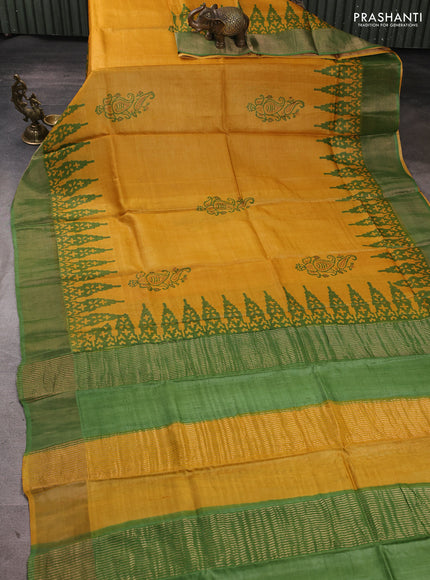 Pure tussar silk saree mustard yellow and green with paisley butta prints and temple design zari woven border