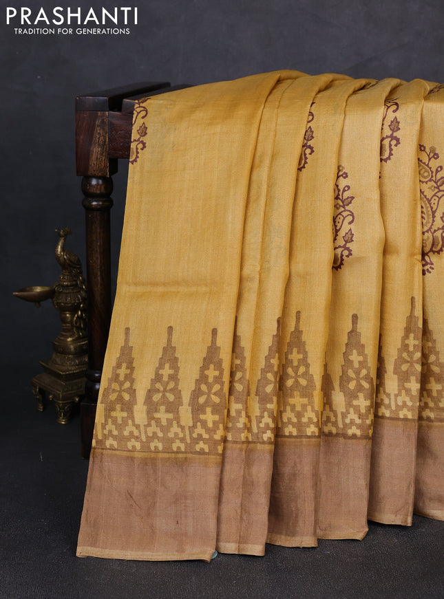 Pure tussar silk saree mustard yellow and dark beige with paisley butta prints and temple design zari woven border