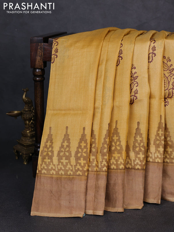 Pure tussar silk saree mustard yellow and dark beige with paisley butta prints and temple design zari woven border