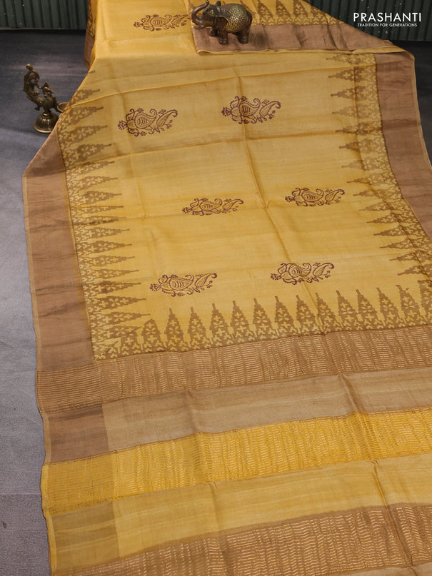Pure tussar silk saree mustard yellow and dark beige with paisley butta prints and temple design zari woven border