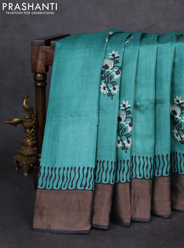 Pure tussar silk saree green and black with floral butta prints and zari woven border