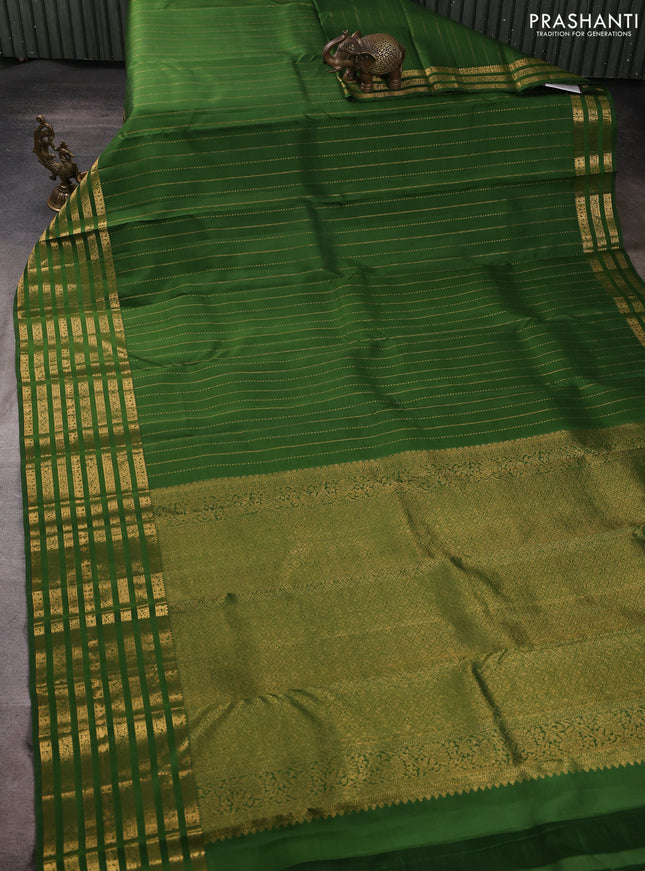 Pure kanchipuram silk saree green with allover zari weaves and long zari woven paisley border