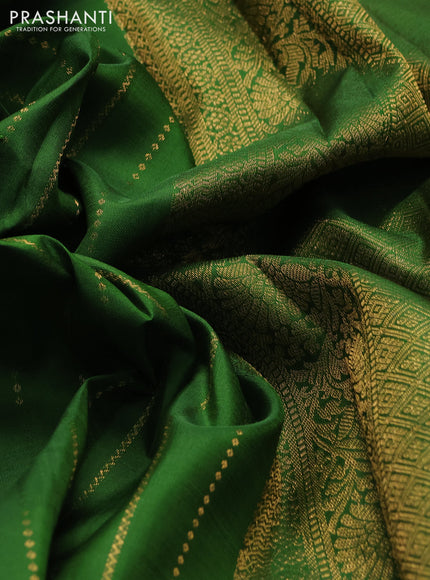 Pure kanchipuram silk saree green with allover zari weaves and long zari woven paisley border