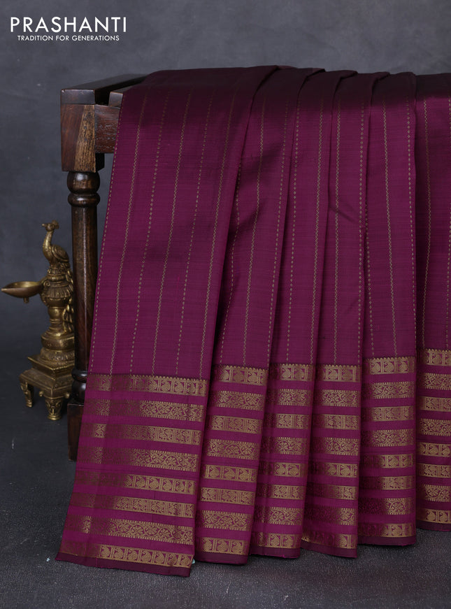 Pure kanchipuram silk saree purple with allover zari weaves and long zari woven paisley border
