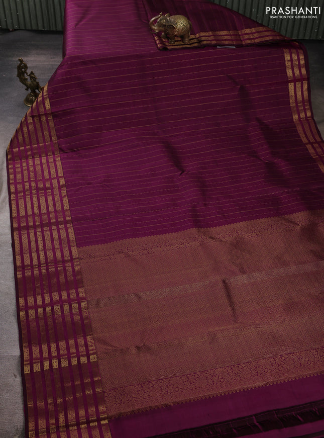 Pure kanchipuram silk saree purple with allover zari weaves and long zari woven paisley border