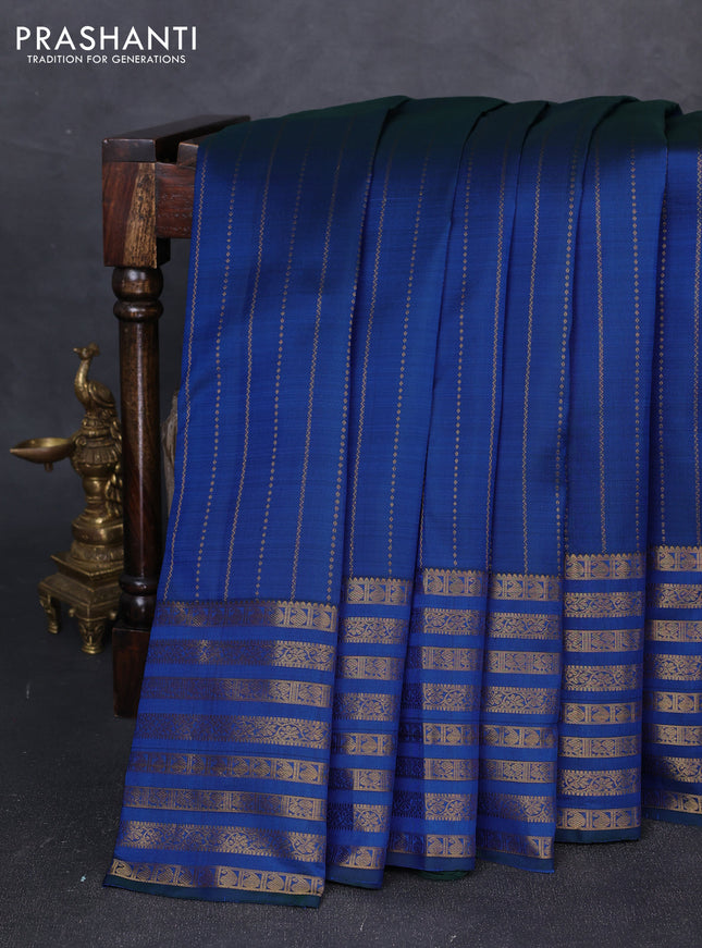 Pure kanchipuram silk saree blue with allover zari weaves and long zari woven paisley border