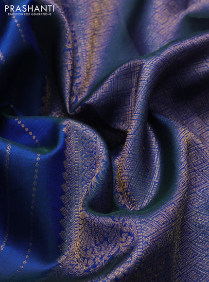 Pure kanchipuram silk saree blue with allover zari weaves and long zari woven paisley border