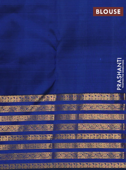 Pure kanchipuram silk saree blue with allover zari weaves and long zari woven paisley border