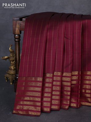 Pure kanchipuram silk saree dark magenta pink with allover zari weaves and long zari woven paisley border