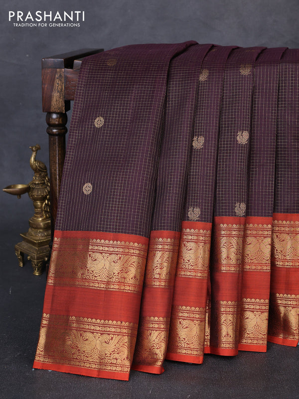 Pure kanchipuram silk saree deep jamun and rustic orange with allover small zari checks & buttas and long rettapet zari woven border