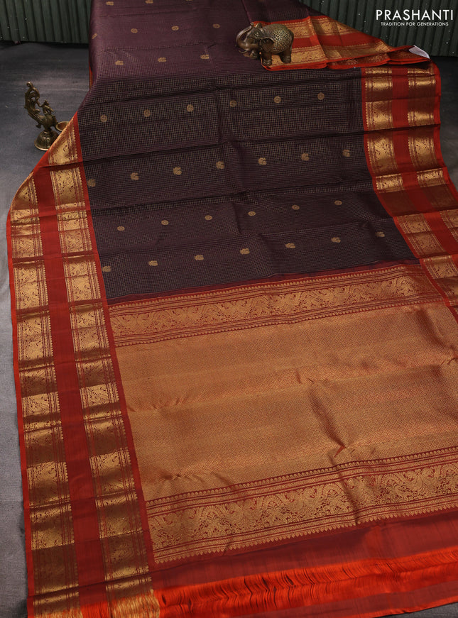 Pure kanchipuram silk saree deep jamun and rustic orange with allover small zari checks & buttas and long rettapet zari woven border