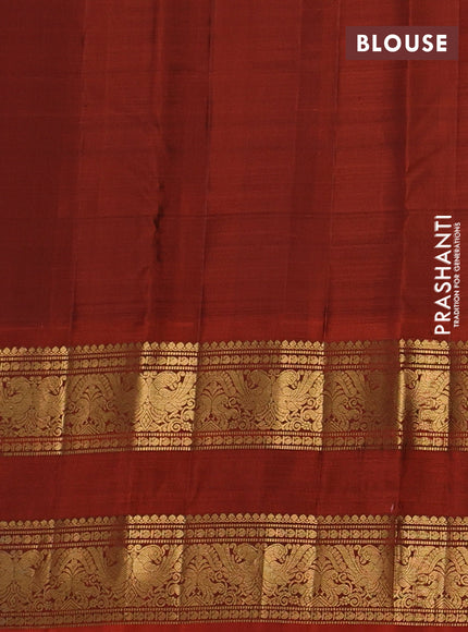 Pure kanchipuram silk saree deep jamun and rustic orange with allover small zari checks & buttas and long rettapet zari woven border