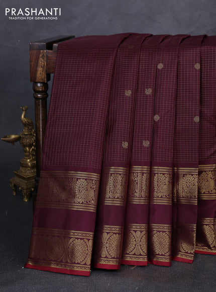 Pure kanchipuram silk saree wine shade with allover small zari checks & buttas and long rettapet zari woven border