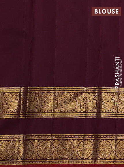 Pure kanchipuram silk saree wine shade with allover small zari checks & buttas and long rettapet zari woven border