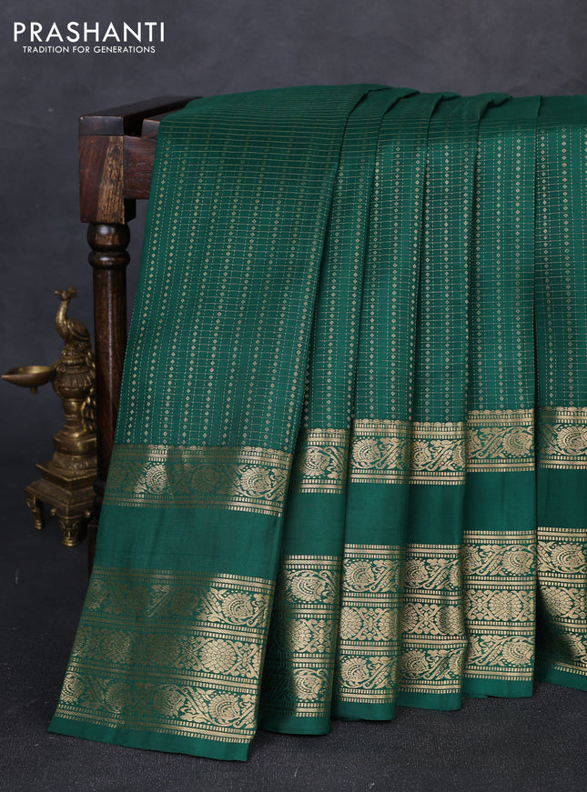 Pure kanchipuram silk saree green with allover small zari checks & buttas and long rettapet zari woven border
