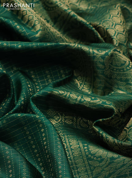 Pure kanchipuram silk saree green with allover small zari checks & buttas and long rettapet zari woven border
