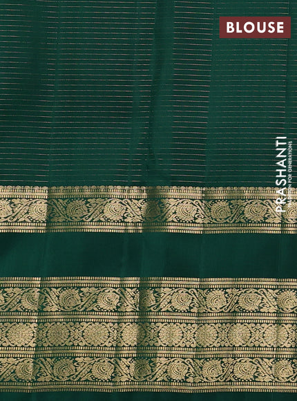 Pure kanchipuram silk saree green with allover small zari checks & buttas and long rettapet zari woven border