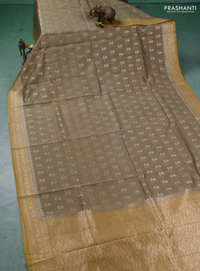 Banarasi silk cotton saree beige and mustard yellow with allover thread & zari woven buttas and woven border