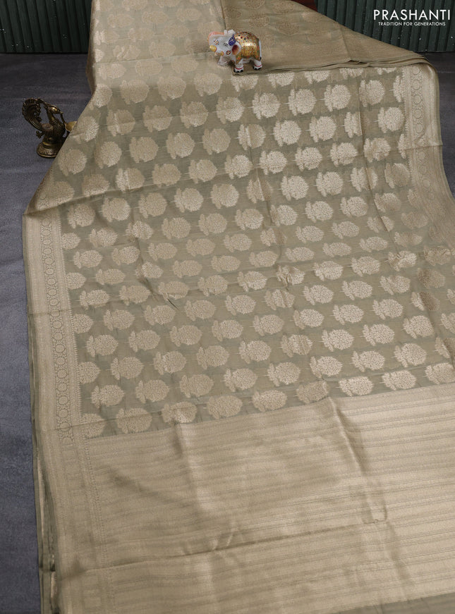 Banarasi silk cotton saree beige with allover thread & zari woven buttas and woven border