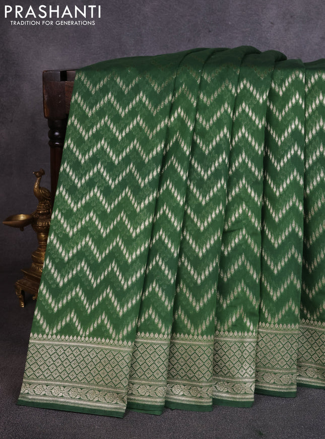 Banarasi silk cotton saree bottle green with allover thread & zari weaves and woven border
