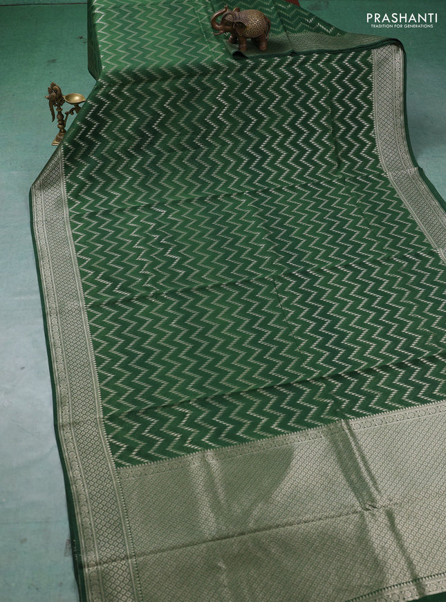 Banarasi silk cotton saree bottle green with allover thread & zari weaves and woven border