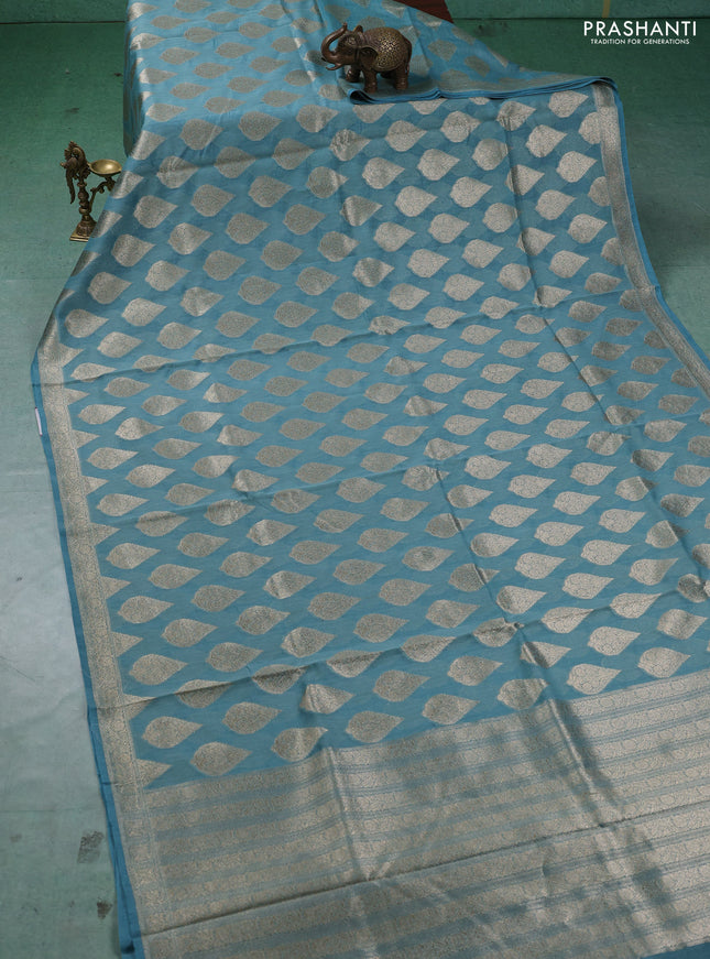 Banarasi silk cotton saree pastel blue with allover thread & zari woven buttas and woven border