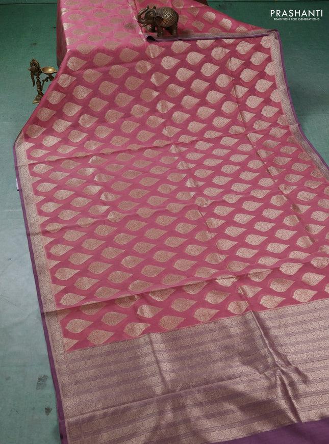 Banarasi silk cotton saree peach pink and pastel purple with allover thread & zari woven buttas and woven border