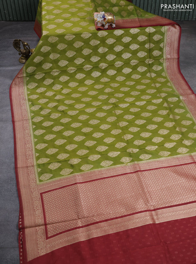 Banarasi silk cotton saree light green and pastel maroon with allover thread & zari woven buttas and woven border