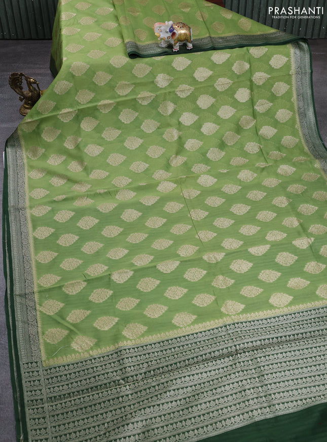 Banarasi silk cotton saree pastel green and bottle green with allover thread & zari woven buttas and woven border
