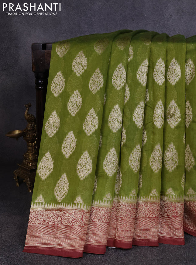 Banarasi silk cotton saree pista green and pastel maroon with allover thread & zari woven buttas and woven border
