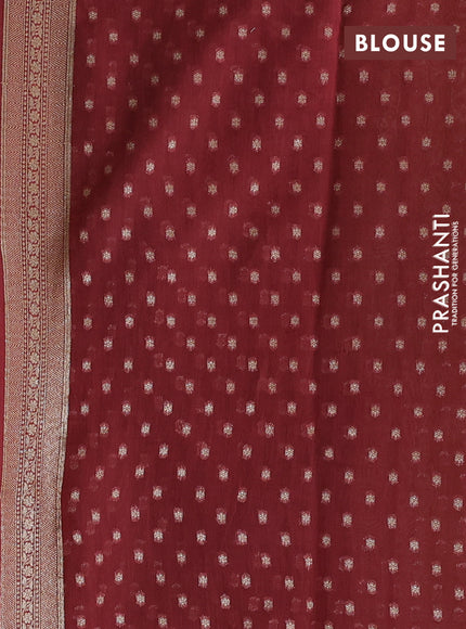 Banarasi silk cotton saree pista green and pastel maroon with allover thread & zari woven buttas and woven border