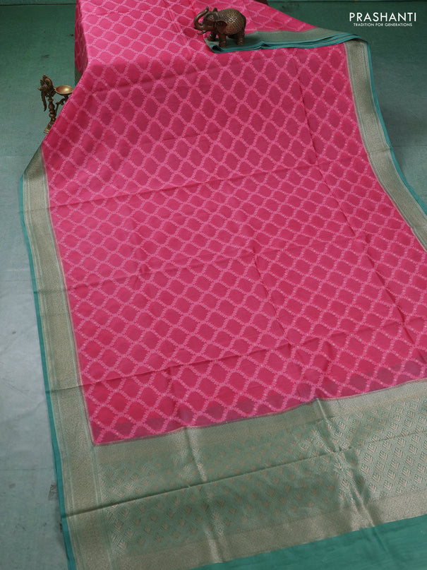 Banarasi silk cotton saree peach pink and teal green with allover thread weaves and thread & zari woven border