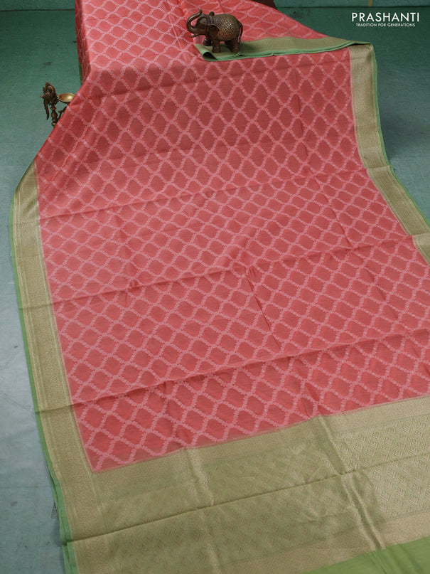 Banarasi silk cotton saree peach orange and light green with allover thread weaves and thread & zari woven border