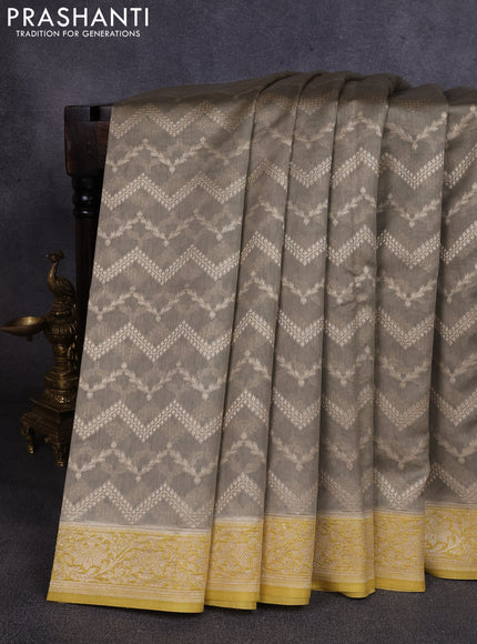 Banarasi silk cotton saree pastel green and yellow with allover thread & zari weaves and woven border
