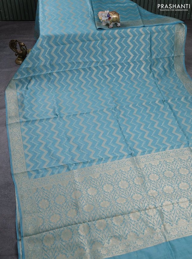 Banarasi silk cotton saree pastel blue with allover thread & zari weaves and woven border