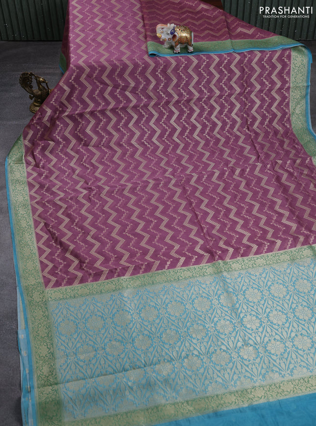 Banarasi silk cotton saree pastel purple and teal blue with allover thread & zari weaves and woven border