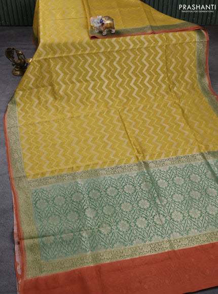 Banarasi silk cotton saree mustard yellow and rust shade with allover thread & zari weaves and woven border