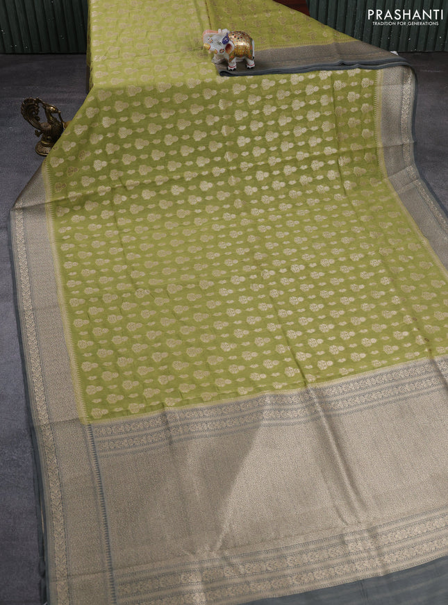 Banarasi silk cotton saree pista green and grey with allover thread & zari woven buttas and woven border