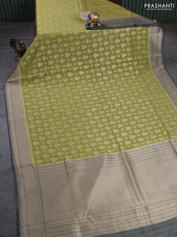 Banarasi silk cotton saree pista green and grey with allover thread & zari woven buttas and woven border