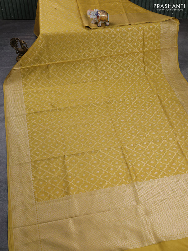 Banarasi silk cotton saree mustard yellow with allover thread & zari weaves and woven border