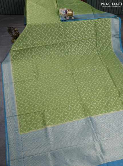 Banarasi silk cotton saree pista green and blue with allover thread & zari weaves and woven border