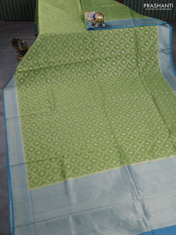 Banarasi silk cotton saree pista green and blue with allover thread & zari weaves and woven border