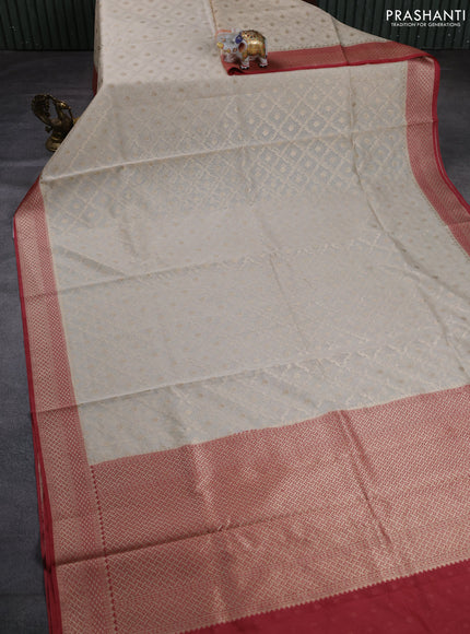 Banarasi silk cotton saree cream and pastel maroon with allover thread & zari weaves and woven border