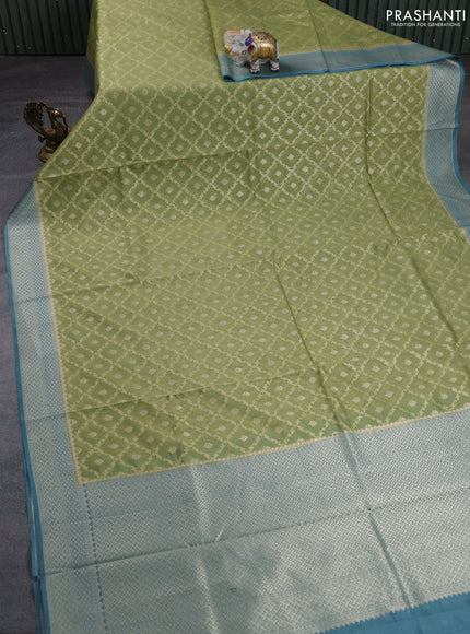 Banarasi silk cotton saree pista green and greish blue with allover thread & zari weaves and woven border