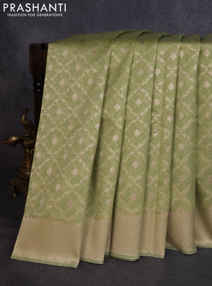 Banarasi silk cotton saree pastel green with allover thread & zari weaves and woven border