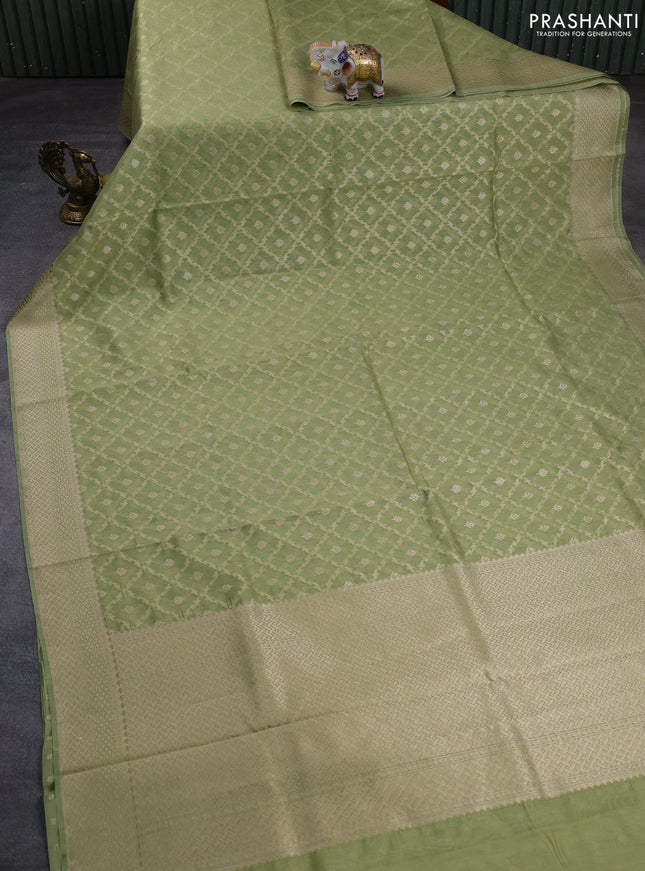 Banarasi silk cotton saree pastel green with allover thread & zari weaves and woven border