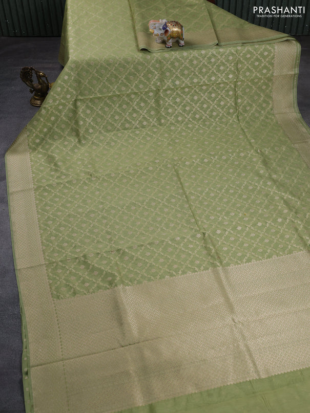 Banarasi silk cotton saree pastel green with allover thread & zari weaves and woven border