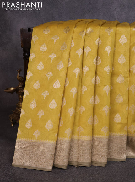 Banarasi silk cotton saree mustard yellow and grey shade with allover thread & zari woven buttas and woven border