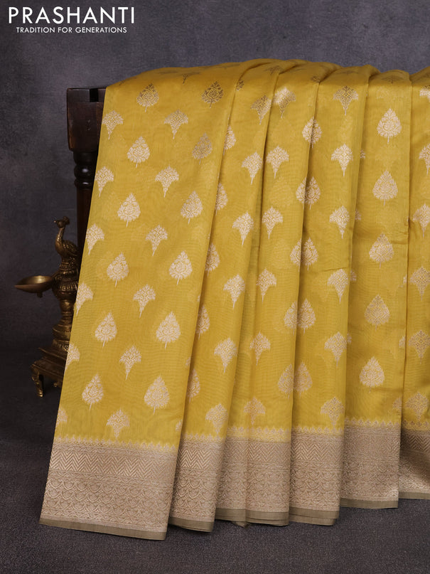 Banarasi silk cotton saree mustard yellow and grey shade with allover thread & zari woven buttas and woven border