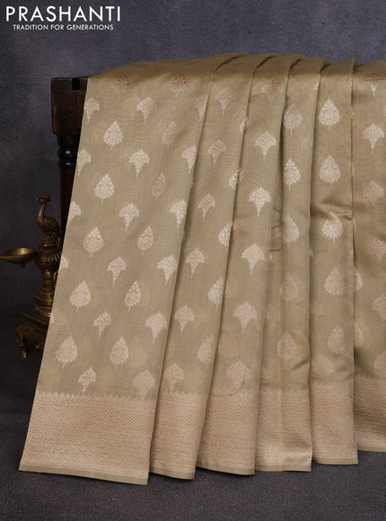 Banarasi silk cotton saree beige with allover thread & zari woven buttas and woven border
